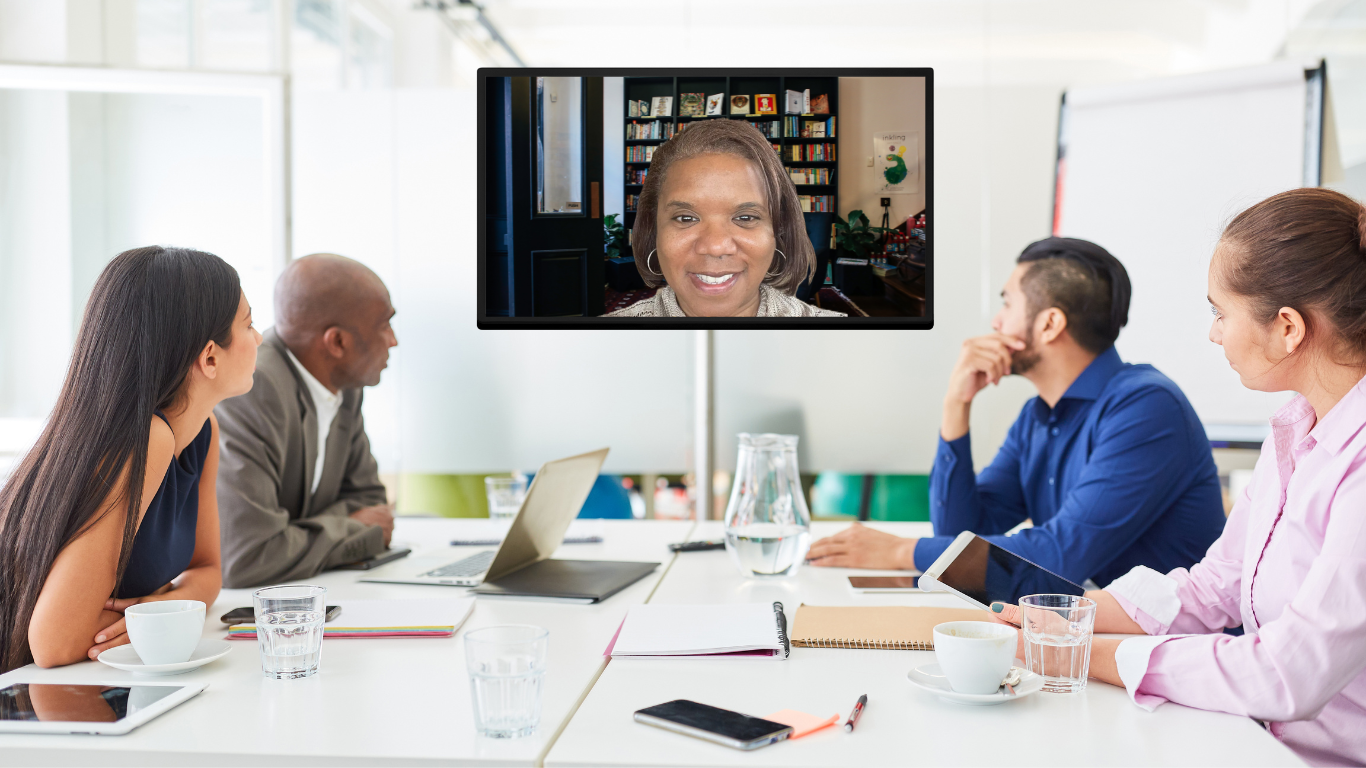 Image of Haletha Judkins in a video meeting with four other people 